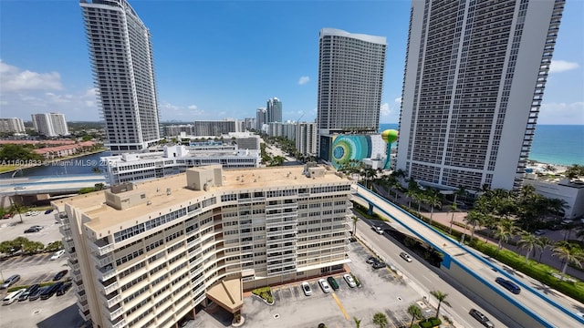 property's view of city featuring a water view