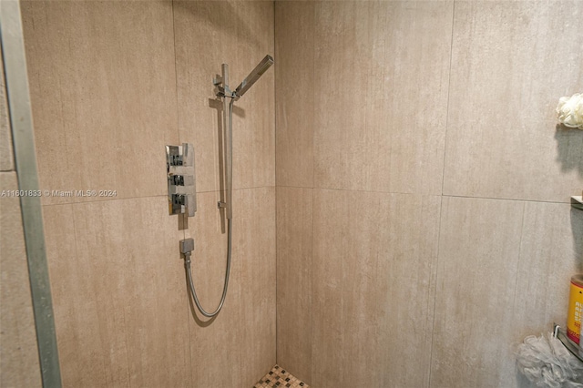 interior space with a tile shower