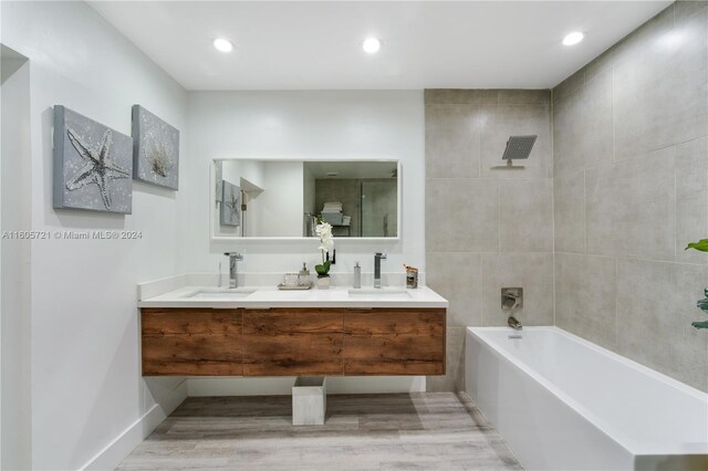 bathroom featuring wood-type flooring and vanity