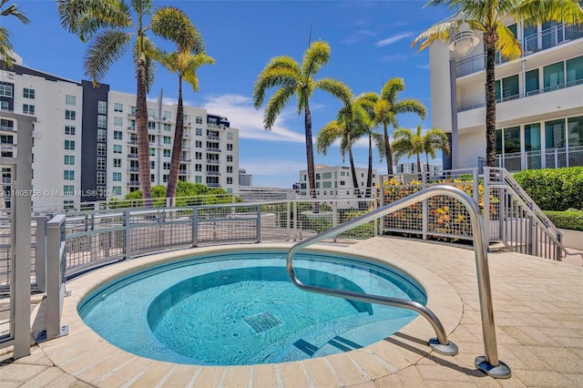 view of pool featuring a hot tub