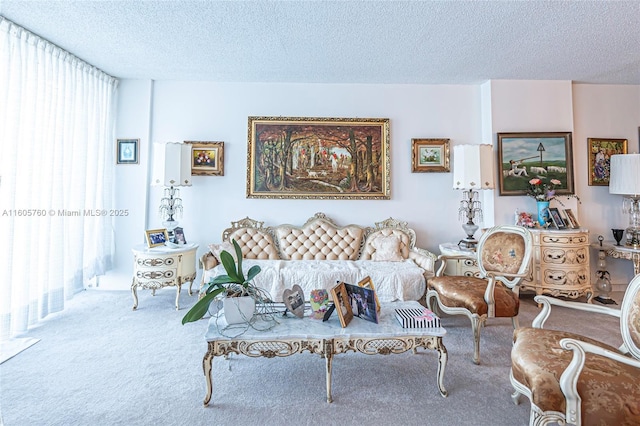 carpeted living room featuring a textured ceiling