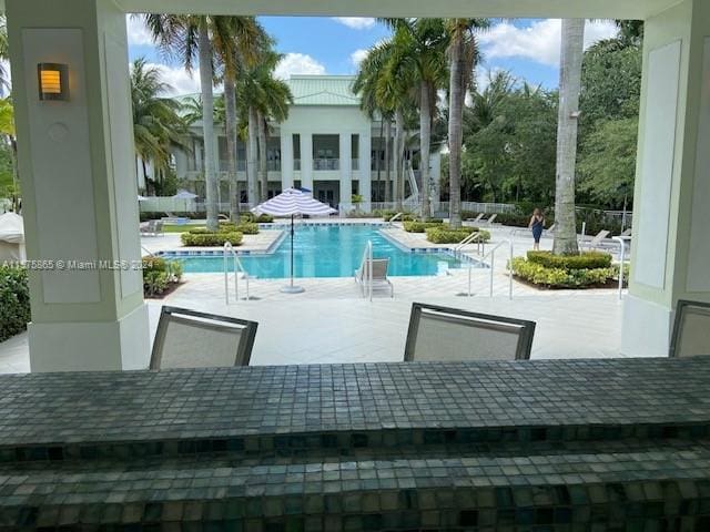 view of pool with a patio area