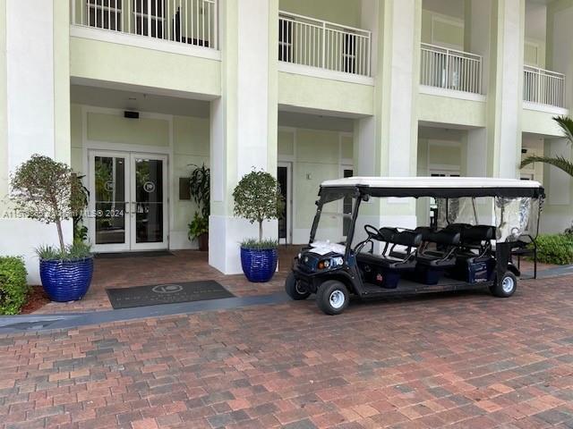 view of exterior entry featuring french doors