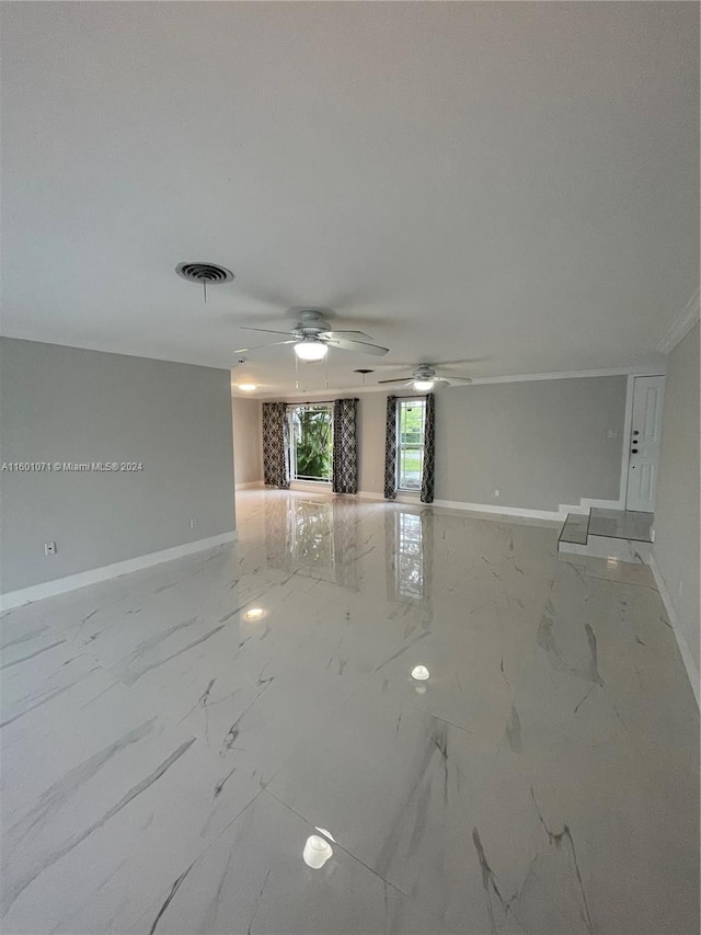 spare room featuring ceiling fan