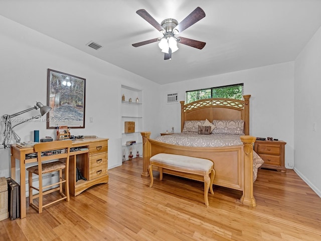 bedroom with ceiling fan and light hardwood / wood-style floors