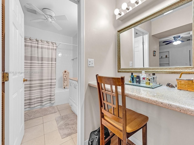 bathroom with ceiling fan, tile patterned flooring, and shower / tub combo with curtain