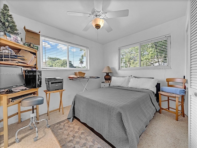 bedroom featuring ceiling fan