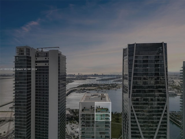 property's view of city featuring a water view