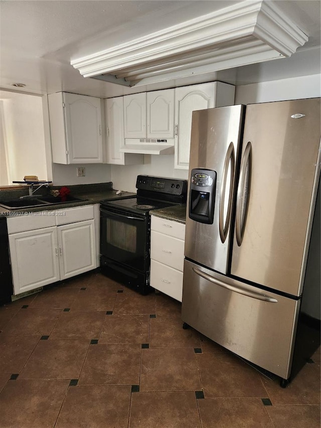 kitchen featuring stainless steel fridge, black electric range oven, custom range hood, sink, and white cabinets