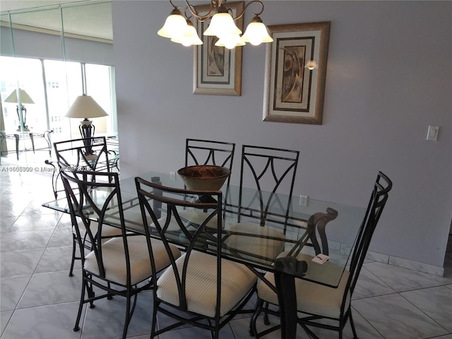 dining room with an inviting chandelier and light tile patterned flooring