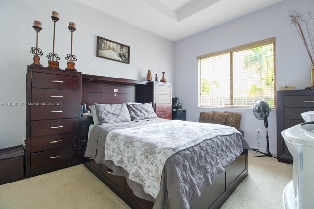 bedroom with light carpet