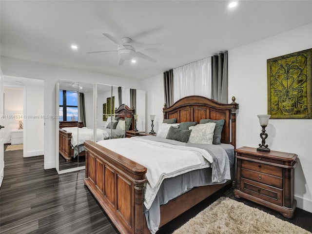 bedroom featuring ceiling fan and dark hardwood / wood-style flooring