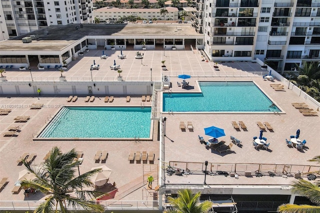 view of pool featuring a patio area