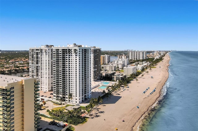 aerial view featuring a water view and a view of the beach