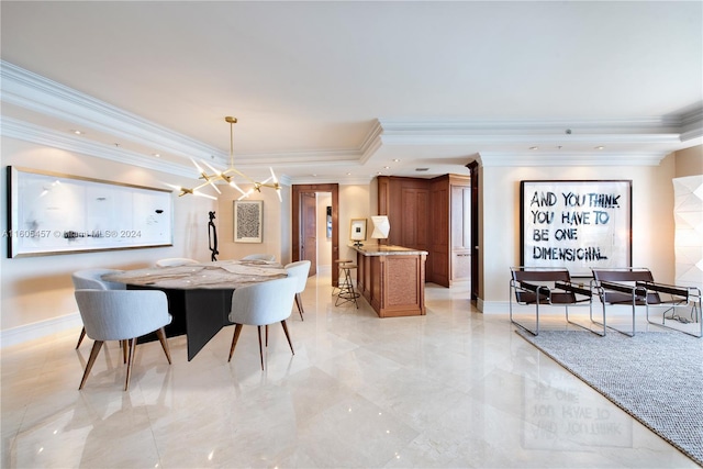 dining space featuring a raised ceiling and ornamental molding