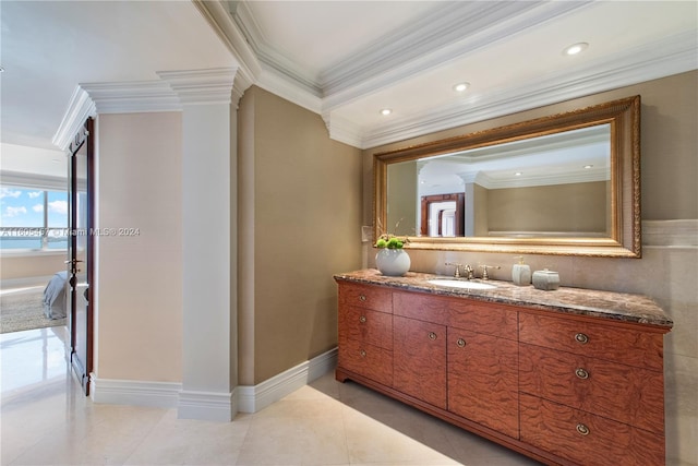 bathroom featuring tile patterned floors, vanity, and ornamental molding