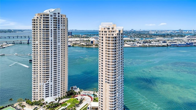 birds eye view of property with a water view