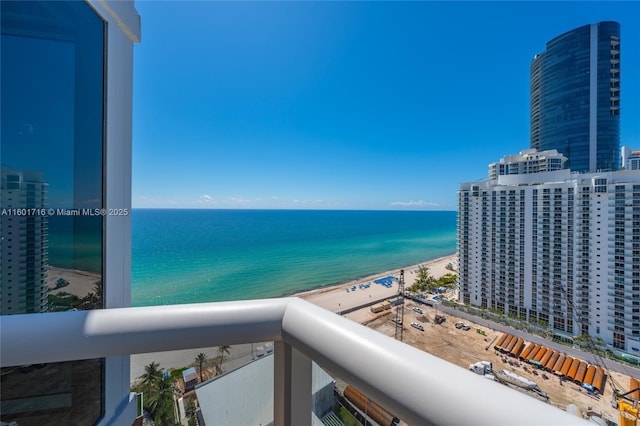 view of water feature with a beach view