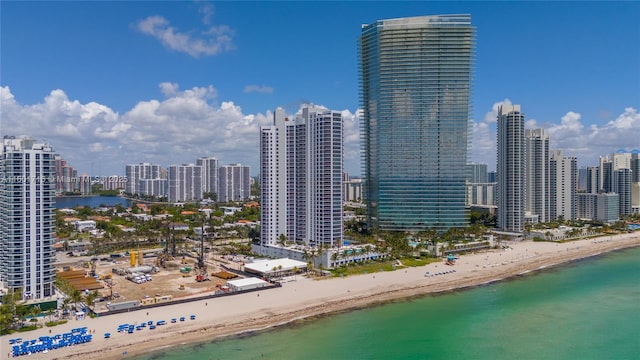 view of city with a view of the beach and a water view