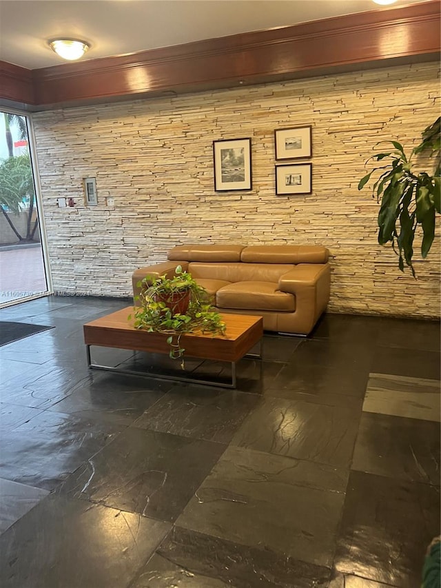 tiled living room featuring wooden walls