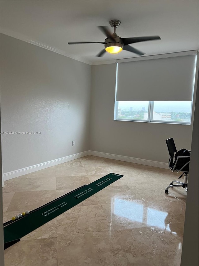 unfurnished office with ceiling fan, tile flooring, and crown molding