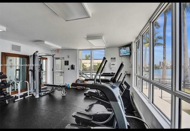 gym with a water view