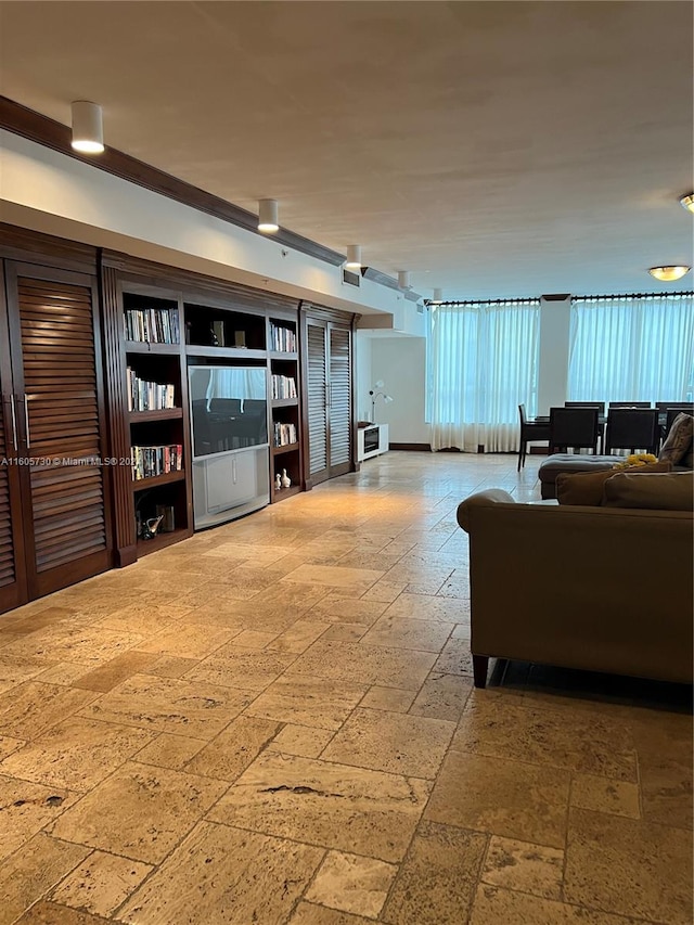 living room with tile flooring