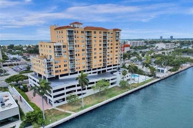 view of building exterior featuring a water view