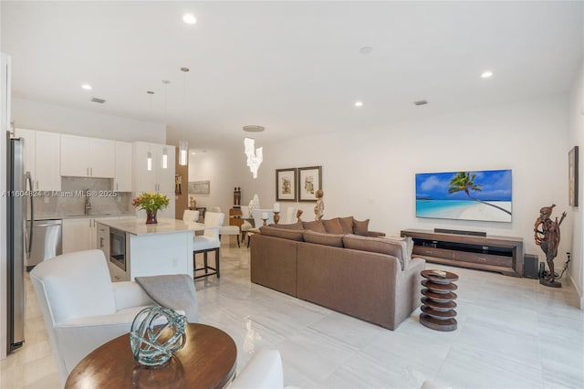 living room featuring sink