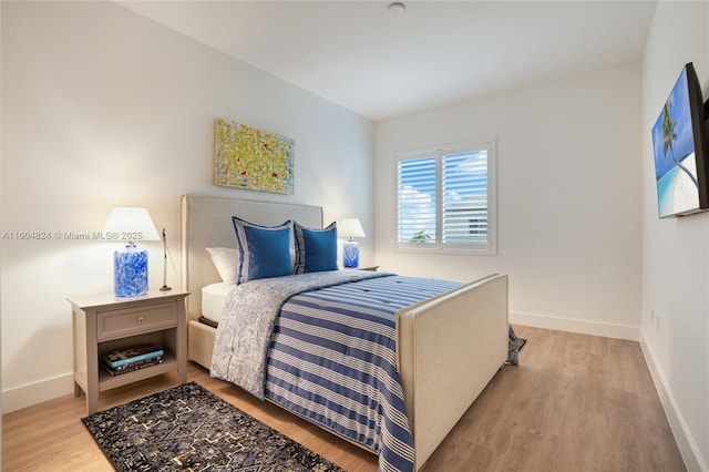 bedroom featuring light hardwood / wood-style flooring