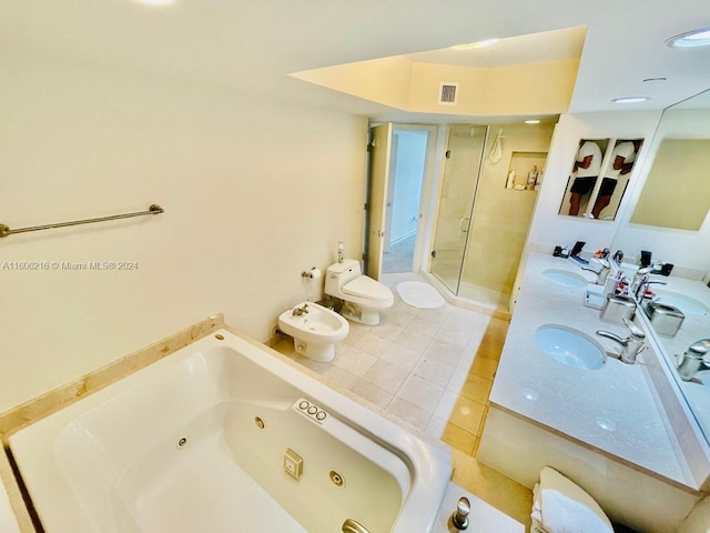 full bathroom with toilet, vanity, tile patterned floors, plus walk in shower, and a bidet