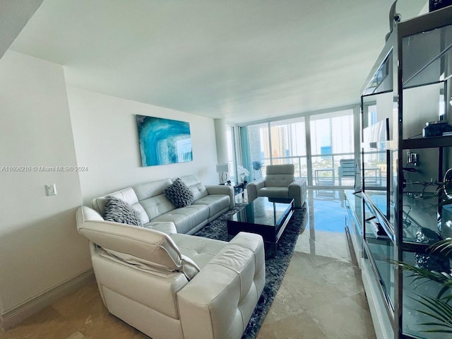 living room with floor to ceiling windows