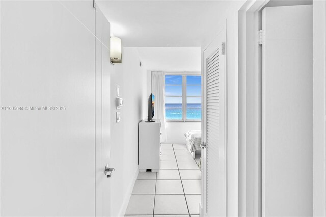 spacious closet featuring light tile patterned flooring