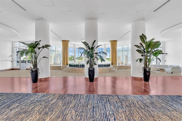 exercise room with a drop ceiling