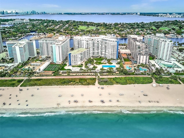 bird's eye view with a beach view and a water view