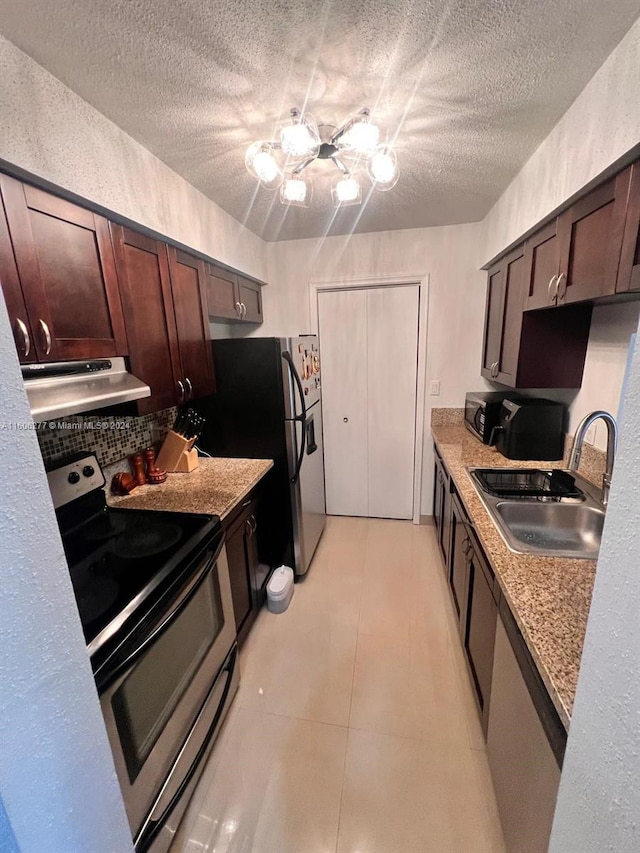 kitchen with a textured ceiling, dark brown cabinets, stainless steel electric range oven, sink, and light tile floors