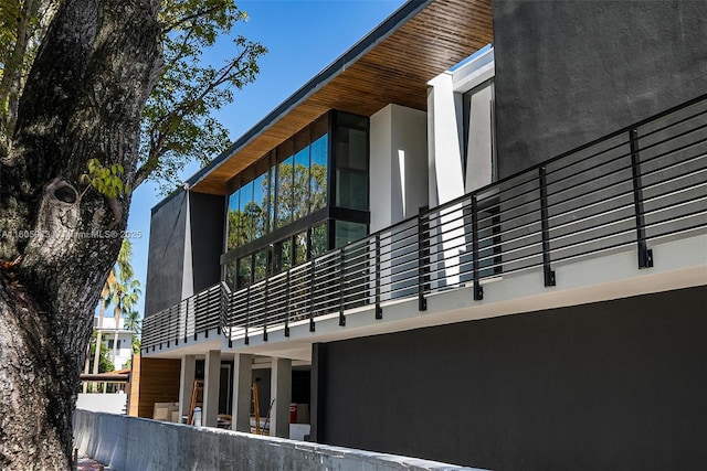 view of property exterior with a balcony