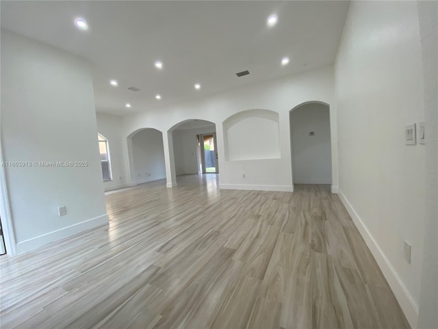 unfurnished room featuring light wood-type flooring