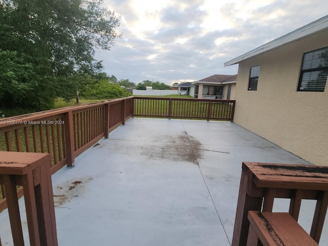 view of patio featuring a balcony