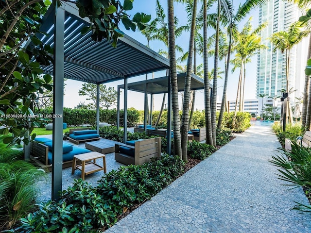 view of patio featuring a pergola and an outdoor hangout area