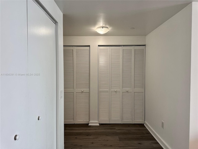 4250 Biscayne Blvd Unit 806, Miami, FL 33137 - interior space featuring dark wood finished floors, two closets, and baseboards