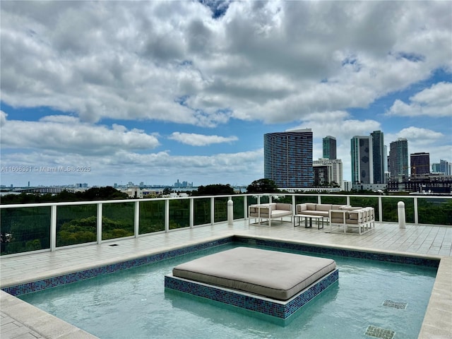 4250 Biscayne Blvd Unit 806, Miami, FL 33137 - community pool featuring a city view and an outdoor hangout area