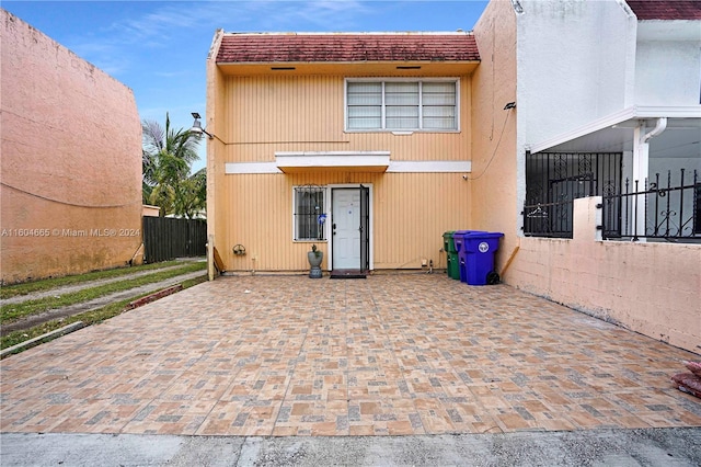 back of house with a patio area