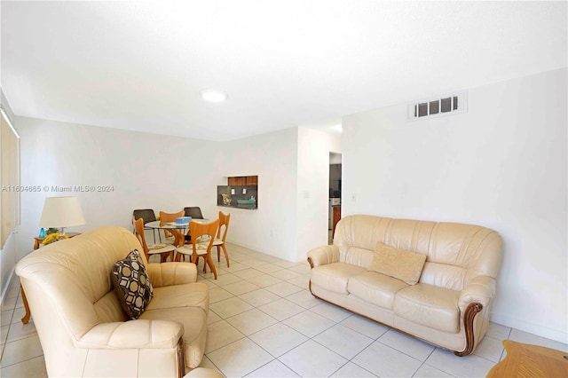 living room with light tile floors