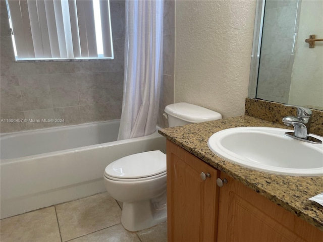 full bathroom with shower / bath combination with curtain, vanity, toilet, and tile floors