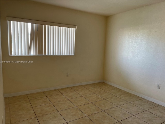 empty room with tile flooring