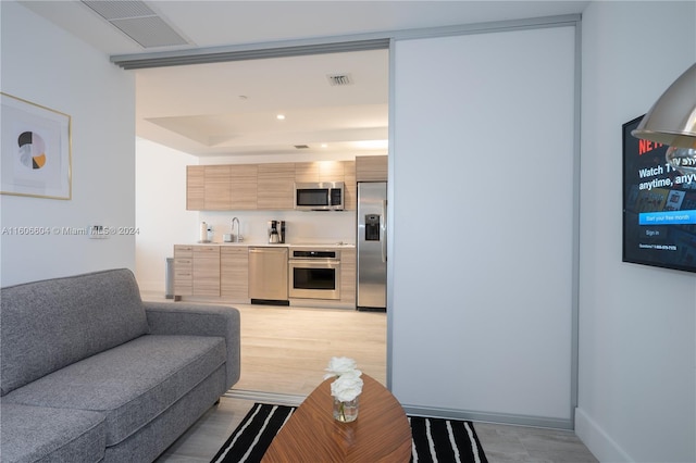 living room with sink