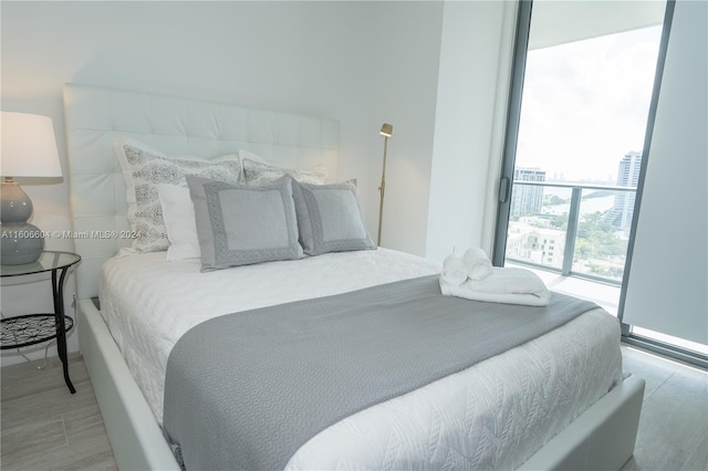 bedroom featuring expansive windows