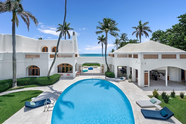 view of pool with a patio and a gazebo