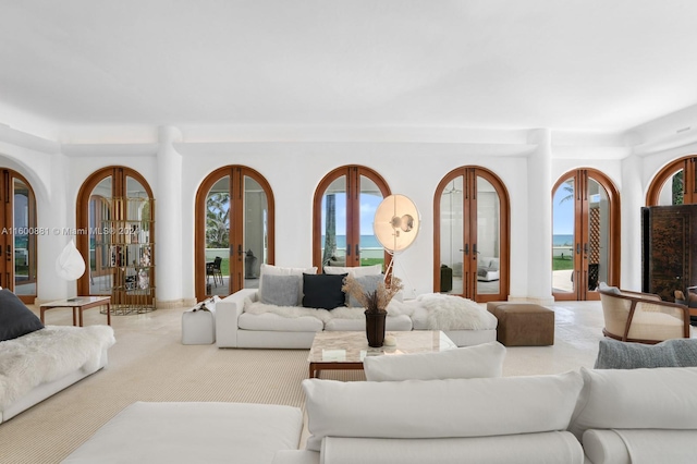 living room with a wealth of natural light and french doors